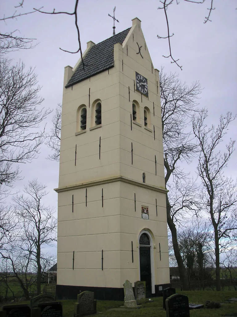 Aegum: Free-standing churchtower on graveyard. The main wing was dismantled in 1856 and rumour has it that the stones were reused to build a pub somewhere nearby.Location: Aegum, Friesland, NetherlandsKeywords: Eagum, church, churchyard