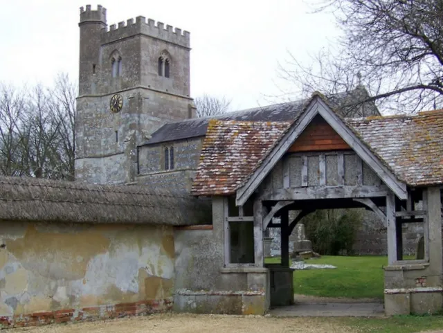 All Saints Church, Enford The oldest surviving portions of the present building are the walls and pillars of the nave, and the remnants of an early church arch. The chancel arch is late Norman, as is the doorway to the south porch. In the 13th century the style of architecture changed rapidly, as the heavy Norman design gave way to lighter, more graceful lines. During the Middle Ages and for some time afterwards the church was almost bare, with the altar table being the only piece of furniture. The floor would have been strewn with rushes, and often scented herbs, which were replaced twice yearly. The church also housed the local school from as early as 1552 to the late 19th century, latterly in the north aisle.