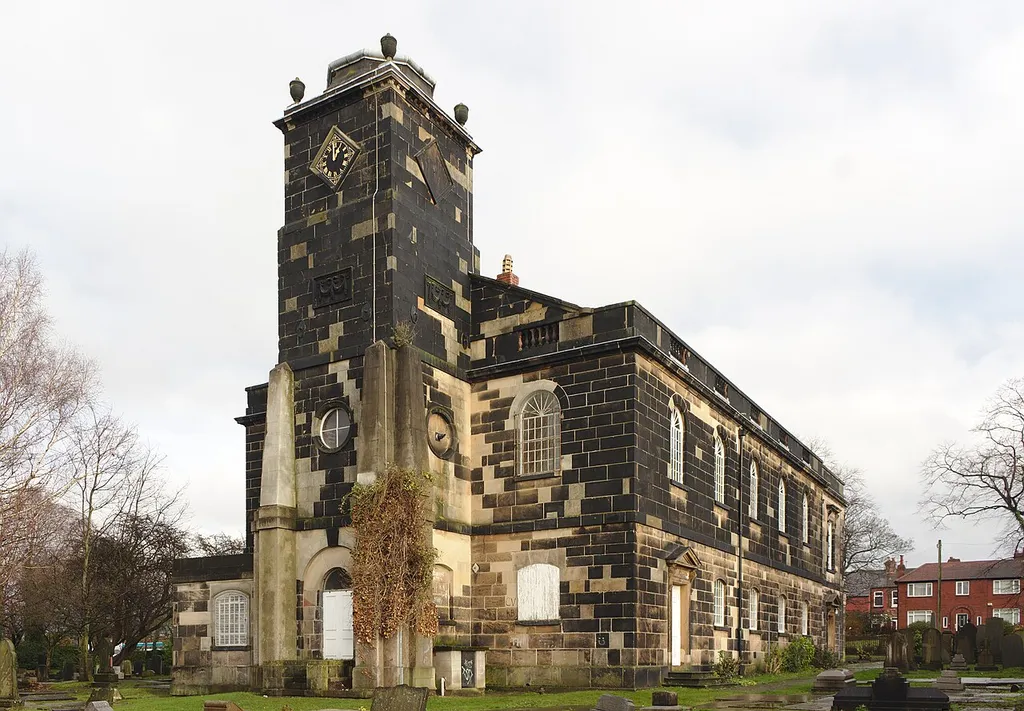 West end with clock tower and south side from the churchyard