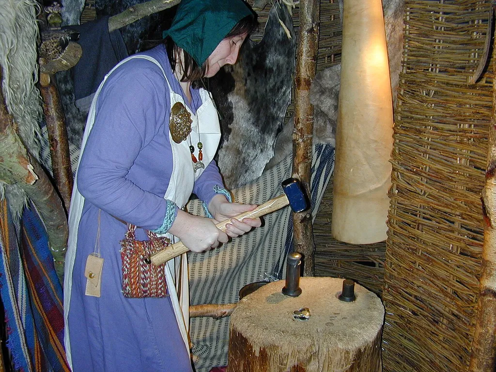 A modern representation of Viking coin making at the Jórvík Viking Centre in York, England. Taken 11 February 2004.