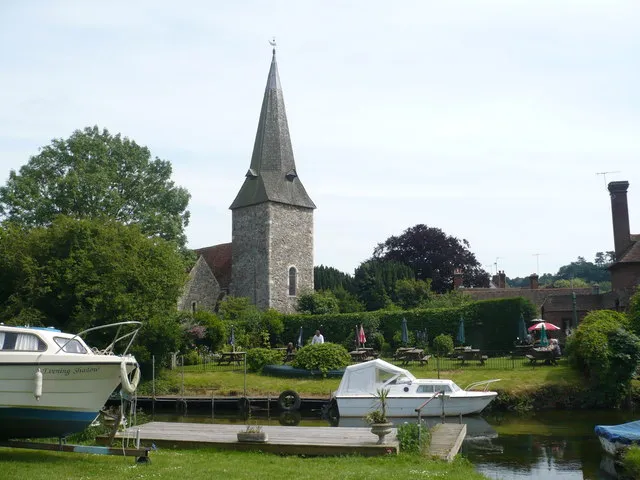 View southeast across the Great Stour at Fordwich, Kent. On the opposite bank of the river is the beer garden of the Fordwich Arms. Beyond that are the west tower ans spire of St Mary's parish church.