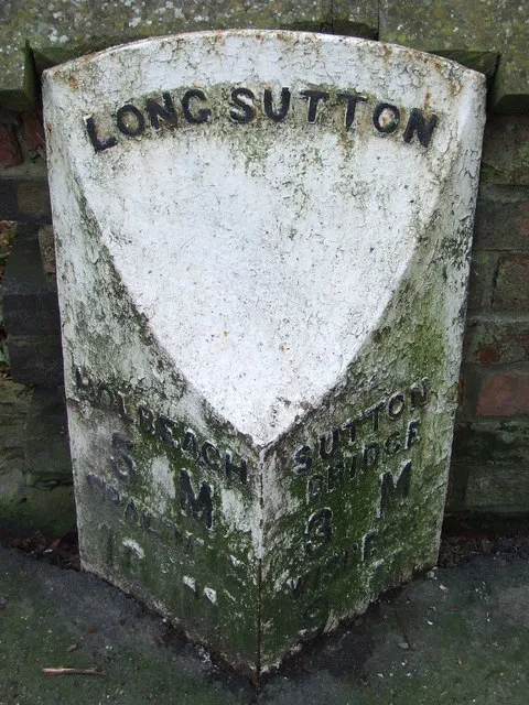 Old Milepost. Old milepost on the B.1359 Long Sutton, Lincolnshire. For overall view see 1186586 For more info on the stone see http://www.milestonesweb.com/sites/tf420238.htm and do have a look at their home page.