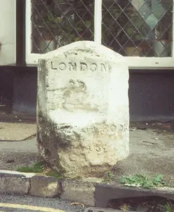 Milestone In Pavement Outside Church Cottage