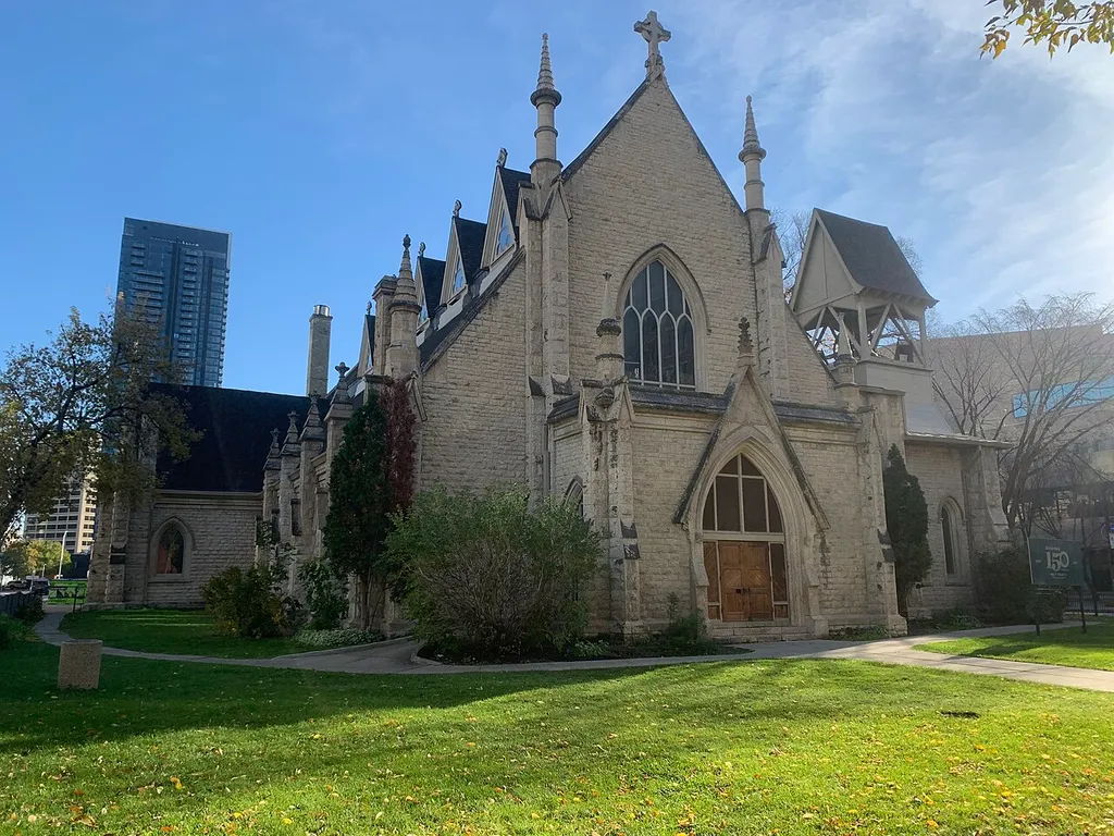 Holy Trinity Anglican Church in Winnipeg, MB. Holy Trinity outgrew three different buildings before settling into this one. Located 256 Smith Street. Dedicated on August 14, 1884.