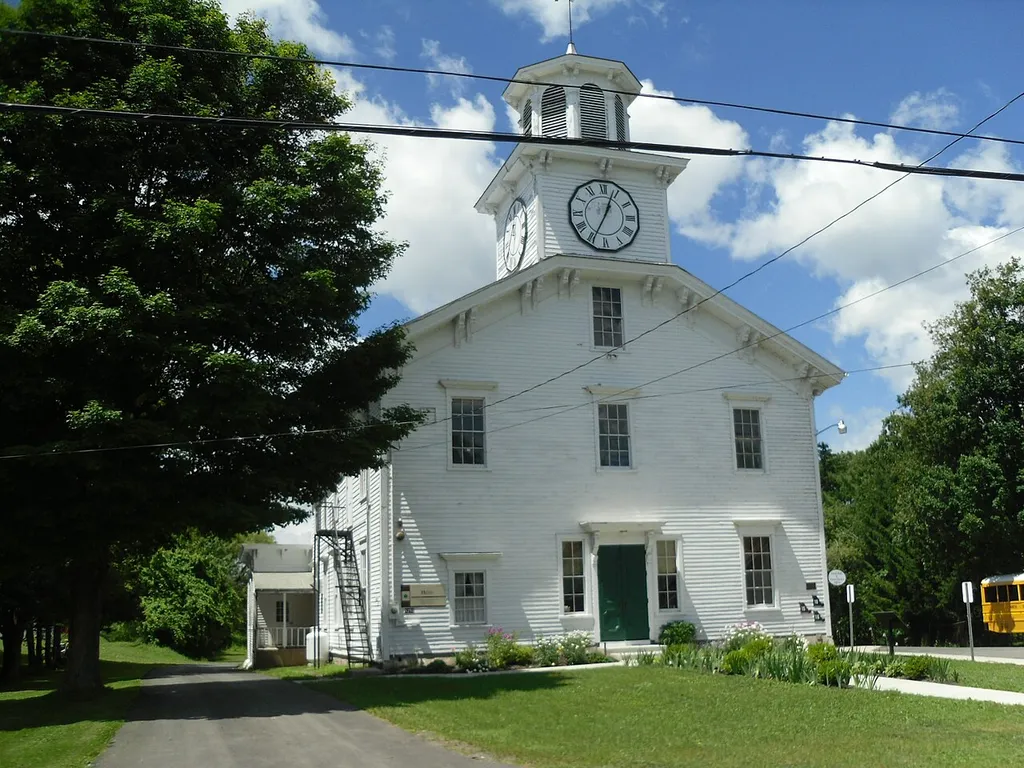 This building in w:Peterboro, New York, was built by Gerrit Smith and housed his land office. The building has had many subsequent uses. Church was just one; it has not been a church for many years. In the 21st century houses the w:National Abolition Hall of Fame and Museum.