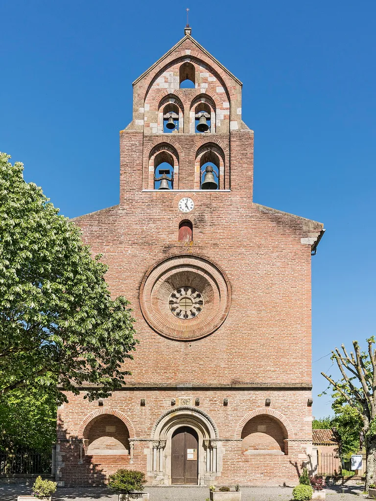 Façade and Bell-gable of the Saint-Christophe-des-Templiers church; a templar church located in Montsaunes, in Occitanie France.