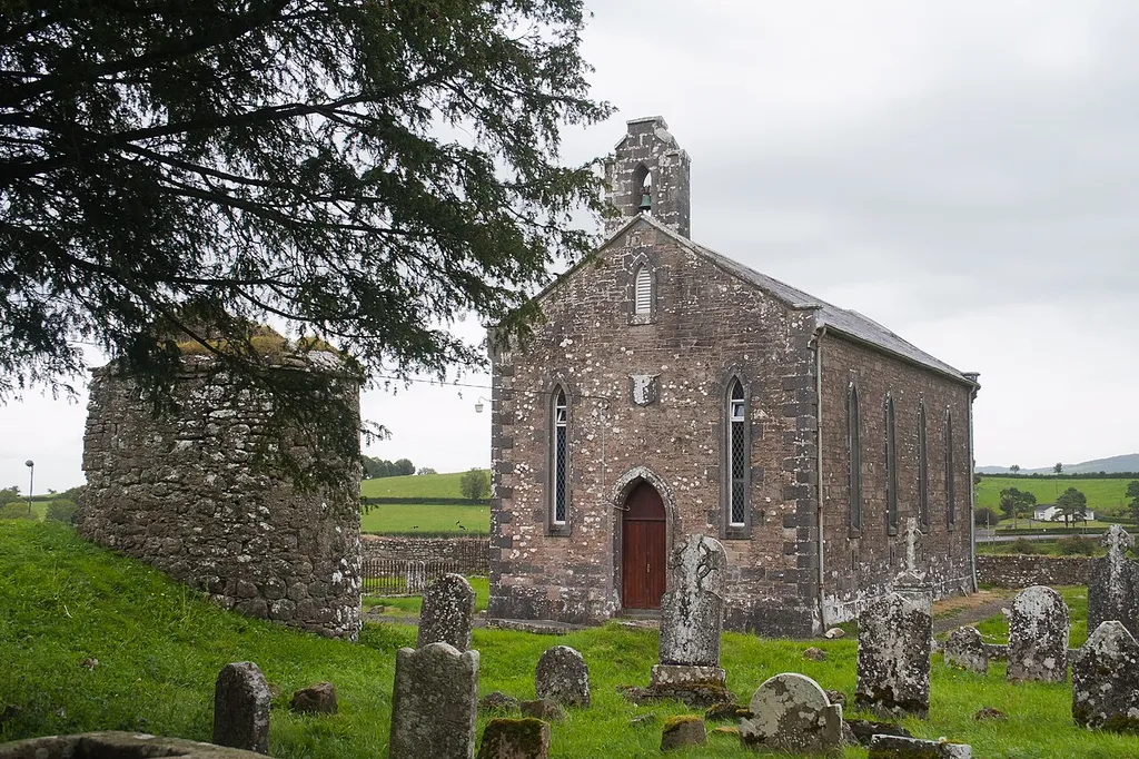 17th-century fortification (left) and 19th-century St. Ciaran's Church (right).