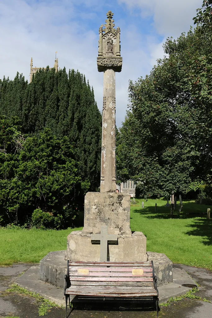 In the churchyard, south of the church