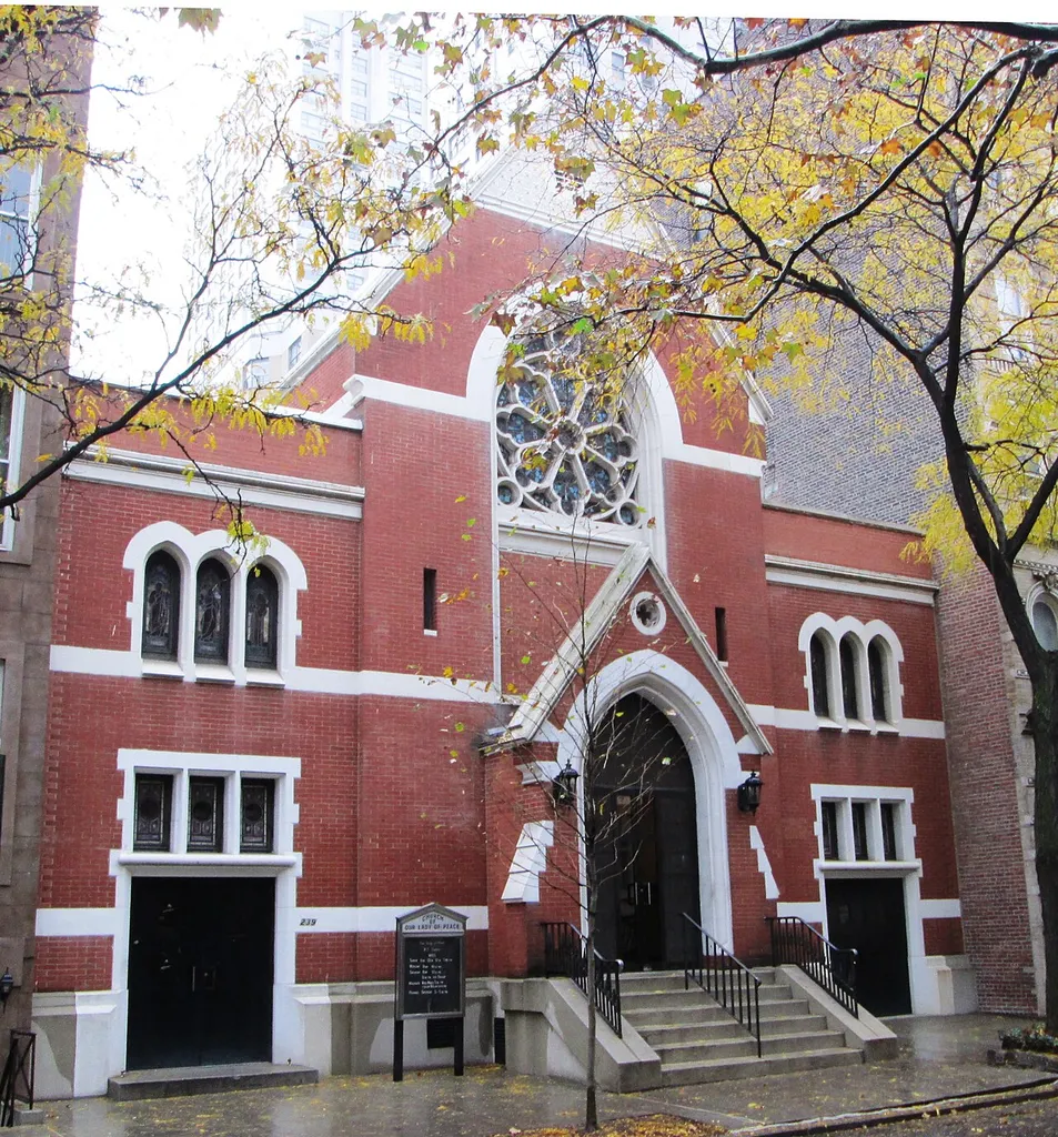 The Roman Catholic Church of Our Lady of Peace, located at 239-241 East 62nd Street between Second and Third Avenues in the Upper East Side neighborhood of Manhattan, New York City, was built in 1886-7 as the Presbyterian Church of the Redeemer, and was designed by Samuel Warner in the Victorian Gothic style. It then became the Bethlehem Church, a Lutheran congregation, before finally becoming the home of the newly formed Italian Madonna della Pace parish in 1918. The church is located in the Treadwell Farm Historic District. (Sources: From Abyssinian to Zion (2004) and Designation Report)