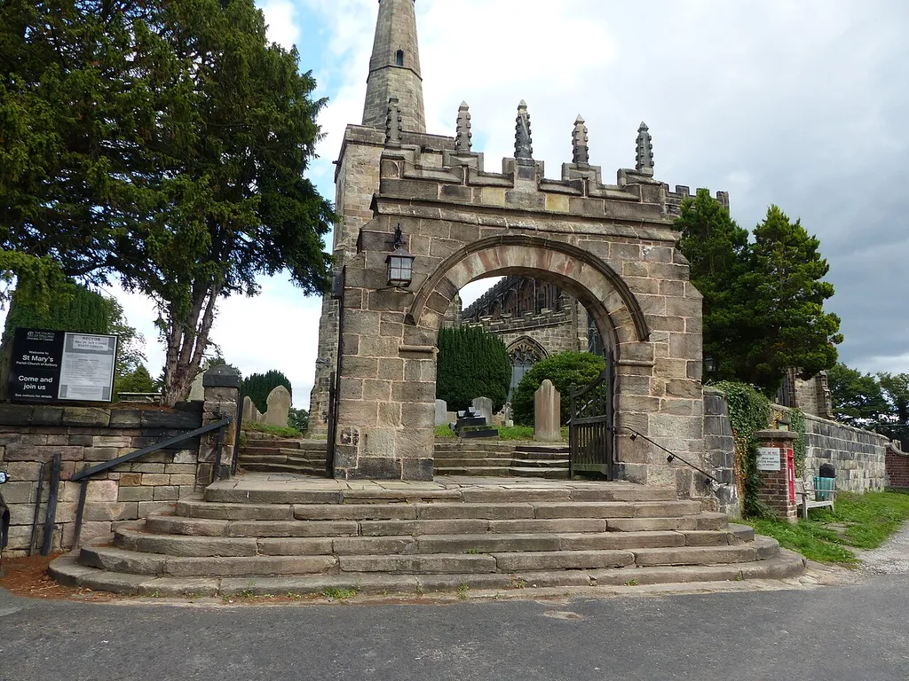 Gateway to churchyard of St Mary: Grade II listed building in Astbury, Cheshire. .mw-parser-output .messagebox{margin:4px 0;width:auto;border-collapse:collapse;border:2px solid var(--border-color-progressive,#6485d1);background-color:var(--background-color-neutral-subtle,#fbfcff);color:var(--color-base,#202122);box-sizing:border-box;border-inline-start-width:8px}.mw-parser-output .messagebox.mbox-small{font-size:88%;line-height:1.25em}.mw-parser-output .mbox-warning,.mw-parser-output .mbox-speedy{border:2px solid var(--border-color-error,#b22222);background:var(--background-color-error-subtle,#ffdbdb);border-inline-start-width:8px}.mw-parser-output .mbox-serious,.mw-parser-output .mbox-delete,.mw-parser-output .mbox-stop{border:2px solid var(--border-color-error,#b22222);border-inline-start-width:8px}.mw-parser-output .mbox-issue,.mw-parser-output .mbox-content{border:2px solid #f28500;background:var(--background-color-warning-subtle,#ffe);border-inline-start-width:8px}.mw-parser-output .mbox-query,.mw-parser-output .mbox-style{border:2px solid #f4c430;background:var(--background-color-warning-subtle,#ffe);border-inline-start-width:8px}.mw-parser-output .mbox-shit{border:2px solid #960;border-inline-start-width:8px}.mw-parser-output .mbox-license{border:2px solid #88a;border-inline-start-width:initial}.mw-parser-output .mbox-legal{border:2px solid var(--border-color-notice,#666);background:var(--background-color-base,#fff);border-inline-start-width:8px}.mw-parser-output .mbox-honor{border:2px solid #ca3;background:var(--background-color-warning-subtle,#fcf4db);border-inline-start-width:8px}.mw-parser-output .mbox-growth{border:2px solid #8d4;background:var(--background-color-success-subtle,#d5fdf4);border-inline-start-width:8px}.mw-parser-output .mbox-move{border:2px solid #93c;border-inline-start-width:8px}.mw-parser-output .mbox-protection,.mw-parser-output .mbox-message{border:2px solid var(--border-color-base,#aaa);border-inline-start-width:8px}.mw-parser-output
