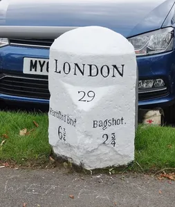 Milestone, London Road, opp. No. 116, by Whites Car sales lot; 50m E of traffic lights,