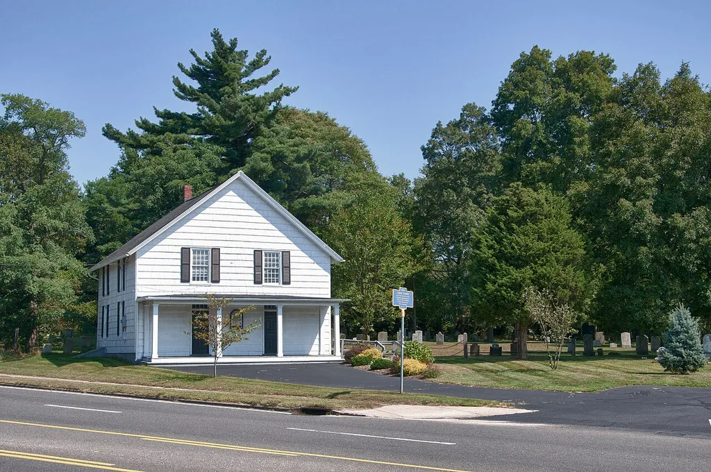 The Commack Methodist Church and Cemetery, as seen from Townline Road. Built in 1789 as Comac Church, it is the oldest Methodist Church building in New York State.