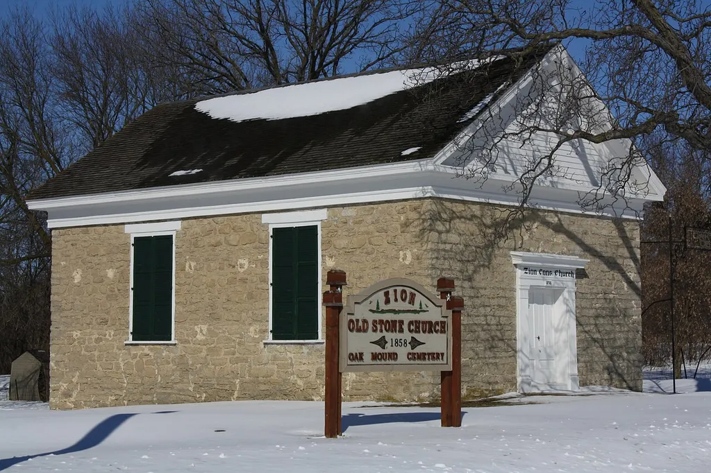 The w:Zion Congregational Church, listed on its sign as the Old Stone Church, near w:Alto, Wisconsin. It is listed on the National Register of Historic Places. This is an image of a place or building that is listed on the National Register of Historic Places in the United States of America. Its reference number is 05001579 (Wikidata).