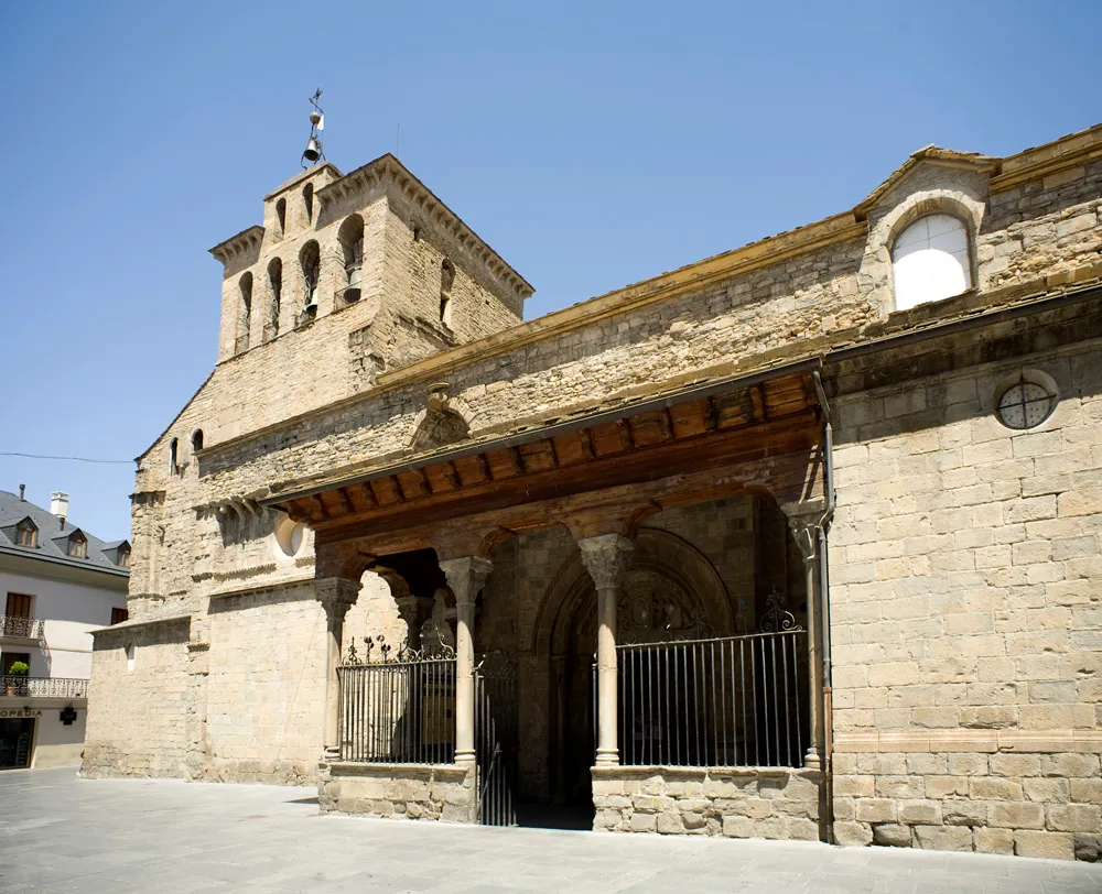 Spain. Aragón, Huesca. Jaca. Catedral de San Pedro de Jaca. Cathedral (Catedral de San Pedro). Exterior. South facade and the portico. Romanesque. 11th century.