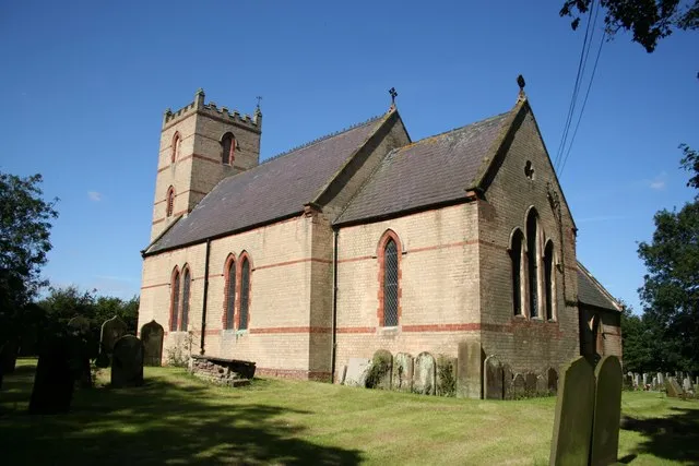 St.Nicholas' Church, Holmpton, East Riding of Yorkshire, England.Striking yellow and red brick rebuild of 1874-80