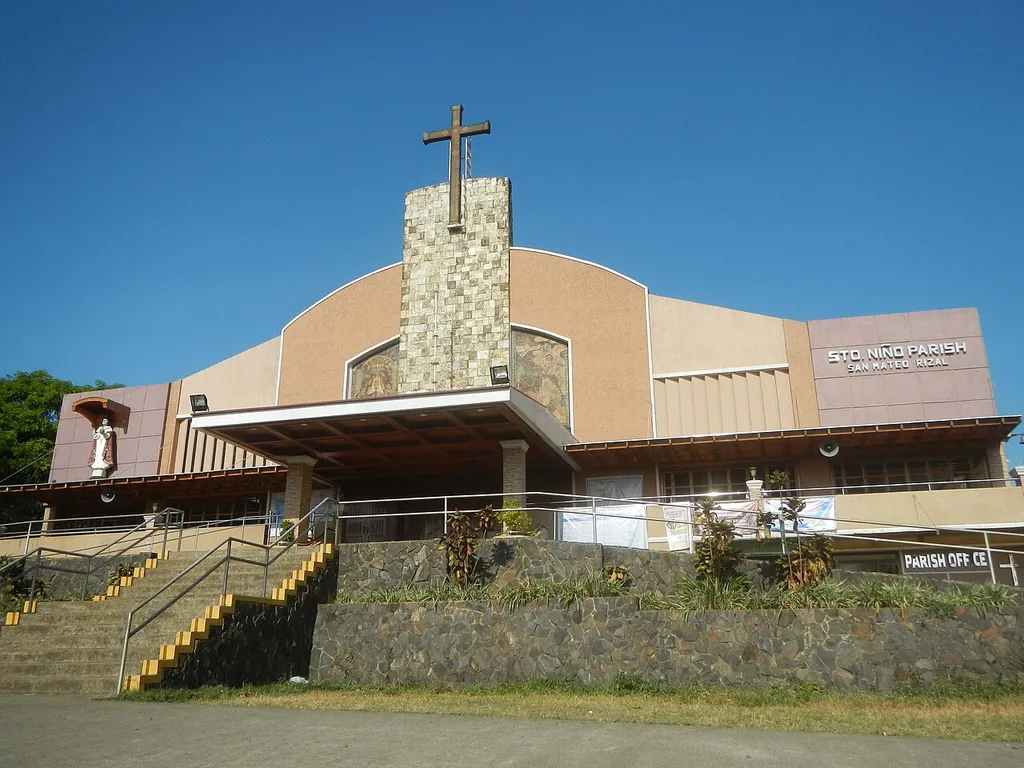 Santo Niño Parish Church (Armel Subdivision, Modesta, Santo Niño, San Mateo, Rizal) Santo Niño Elementary School (Modesta Village, Santo Niño, San Mateo, Rizal) General Antonio Luna Avenue General Antonio Luna 14°41'3"N 121°6'57"E, Barangays Santo Niño 14°40'10"N 121°8'5"E Gulod Malaya 14°40'39" 121°7'53"E Ampid 1 14°40'47"N 121°7'5"E Ampid 2 14°41'2"N 121°7'13"E Guitnang Bayan 1 14°41'3"N 121°7'56"E Guitnang Bayan 2 14°41'4"N 121°8'54"E Maly 14°42'23"N 121°9'2"E Banaba 14°40'23"N 121°7'3"E, San Mateo, Rizal from Batasan–San Mateo Road Batasan Hills, Quezon City, Metro Manila, formerly known as Constitution Hill, corner Commonwealth Avenue, Quezon City formerly known as Don Mariano Marcos Avenue as part of Radial Road 7 (R-7) to Batasan Road (Note: Judge Florentino Floro, the owner, to repeat, Donor Florentino Floro of all these photos hereby donate gratuitously, freely and unconditionally all these photos to and for Wikimedia Commons, exclusively, for public use of the public domain, and again without any condition whatsoever).