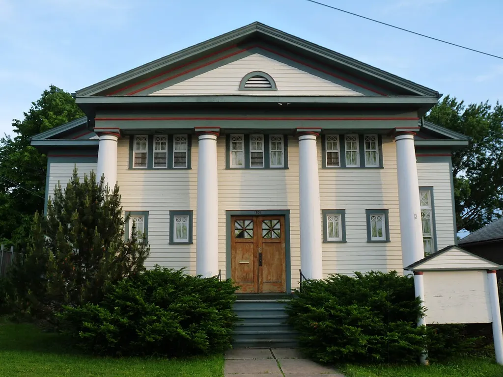 First Church of Christ, Scientist, in Neillsville Wisconsin was built in 1916 in the shape of a Greek cross. It is now on the National Register of Historic Places.